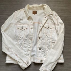 Distressed denim jacket